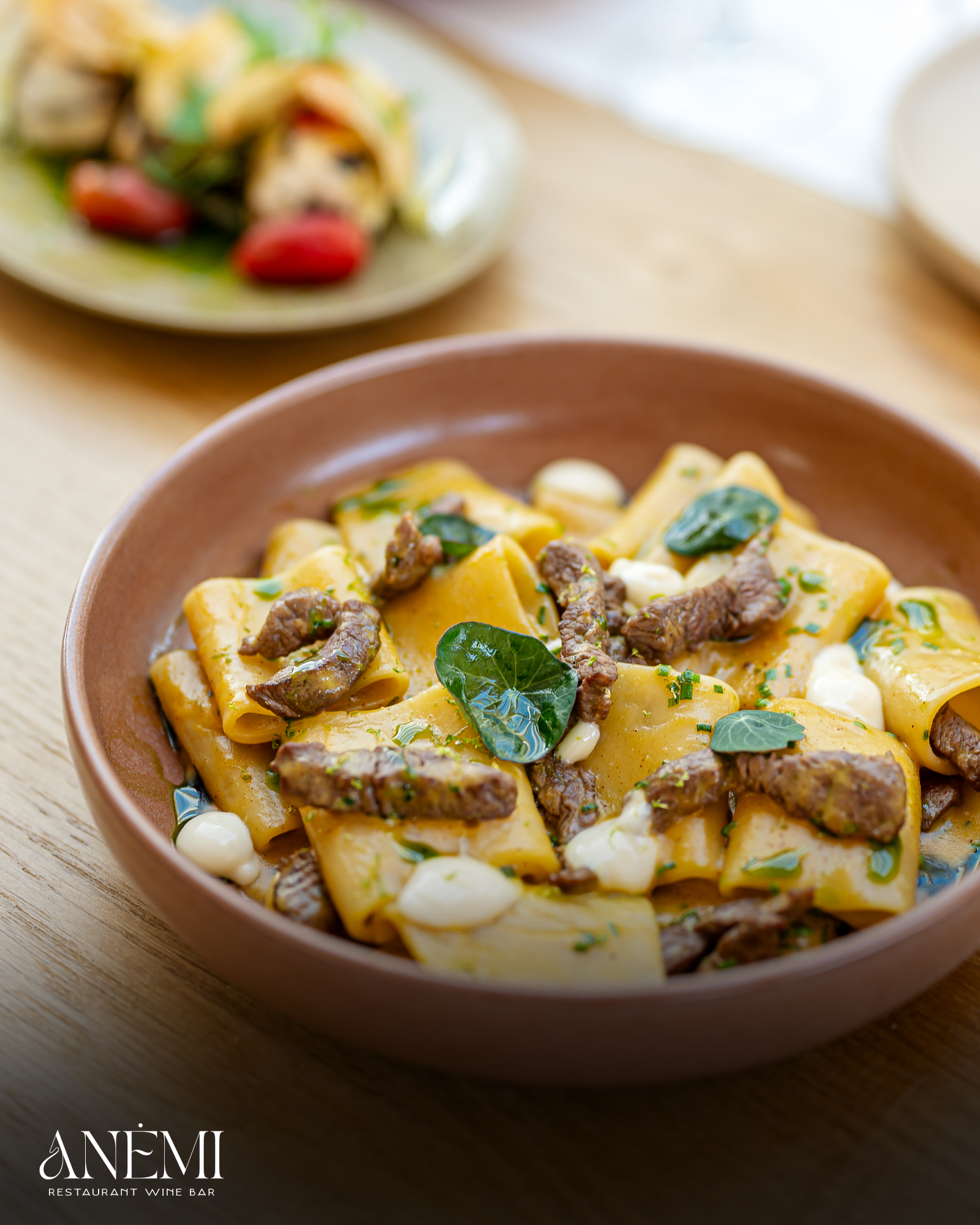 Paccheri pasta in a ceramic bowl